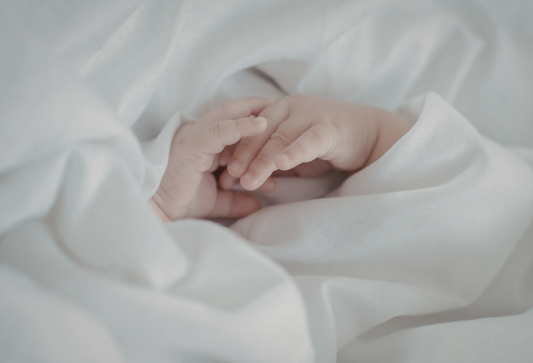 What Is a Baby Swaddle and How Does It Improve Newborn Sleep?