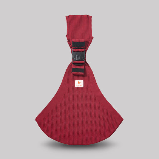 Coshen seamless 3D knit baby carrier in cherry red, showcasing a bold premium aesthetic, ergonomic front view, and healthy M-position for babies.