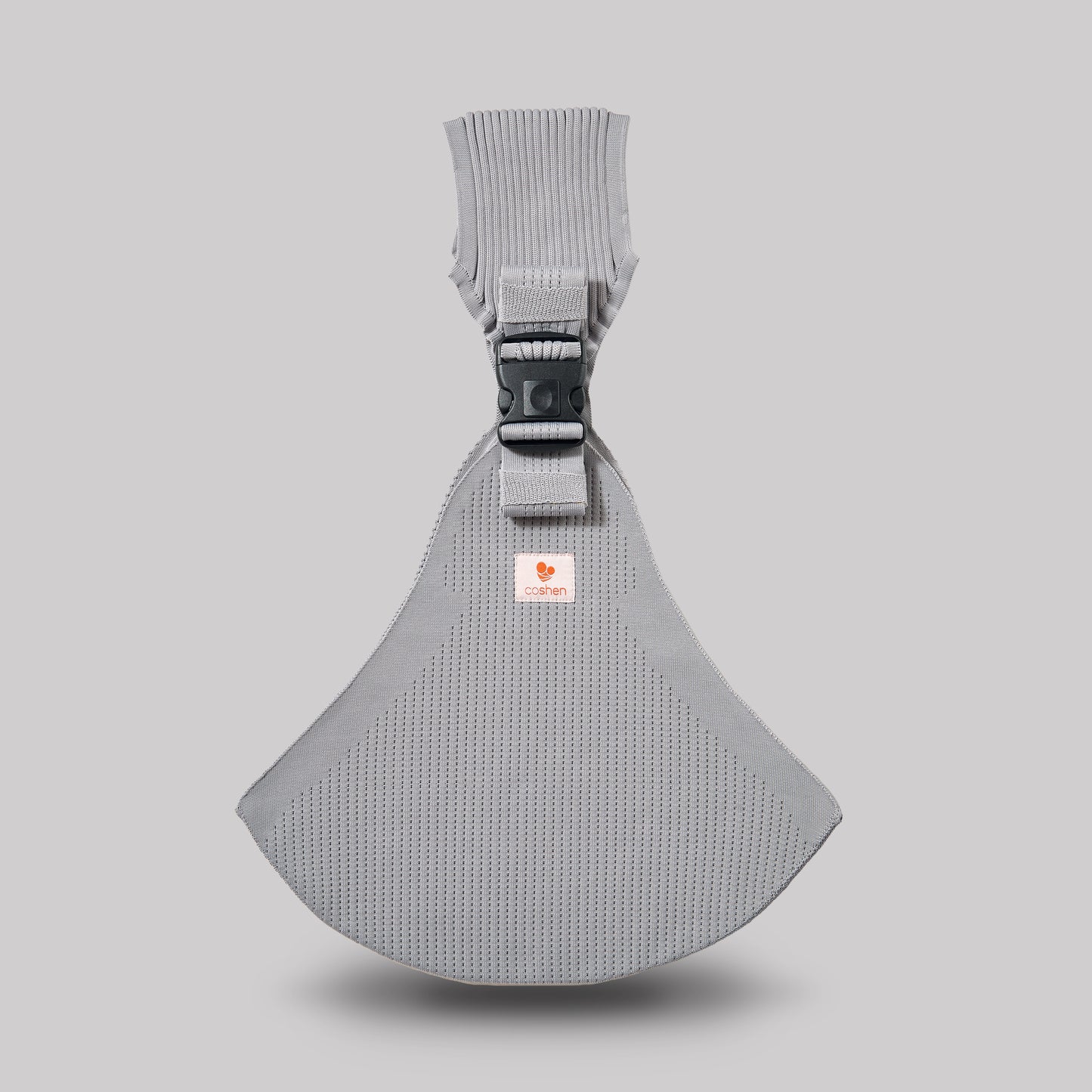 Angled perspective view of the silver Coshen carrier, highlighting the advanced 3D knit technical textile and minimalist seamless design for stylish parents.