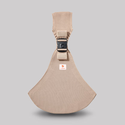 Front view of the Coshen Icon Series toddler carrier in beige, highlighting the breathable 3D knit texture and the durable safety buckle system.