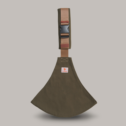 Green Toddler hip carrier used from 9 months to 48 months